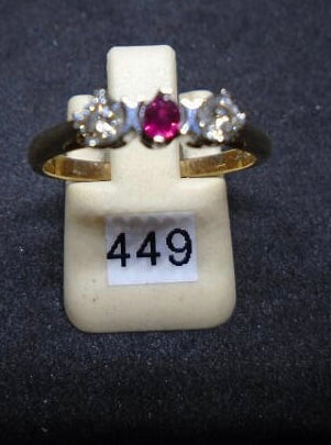 Ladies 9ct yellow gold three stone ruby ring image 0